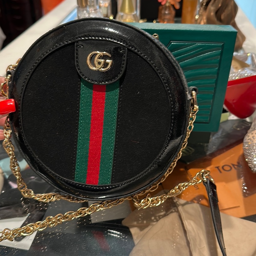 Black Gucci mini round